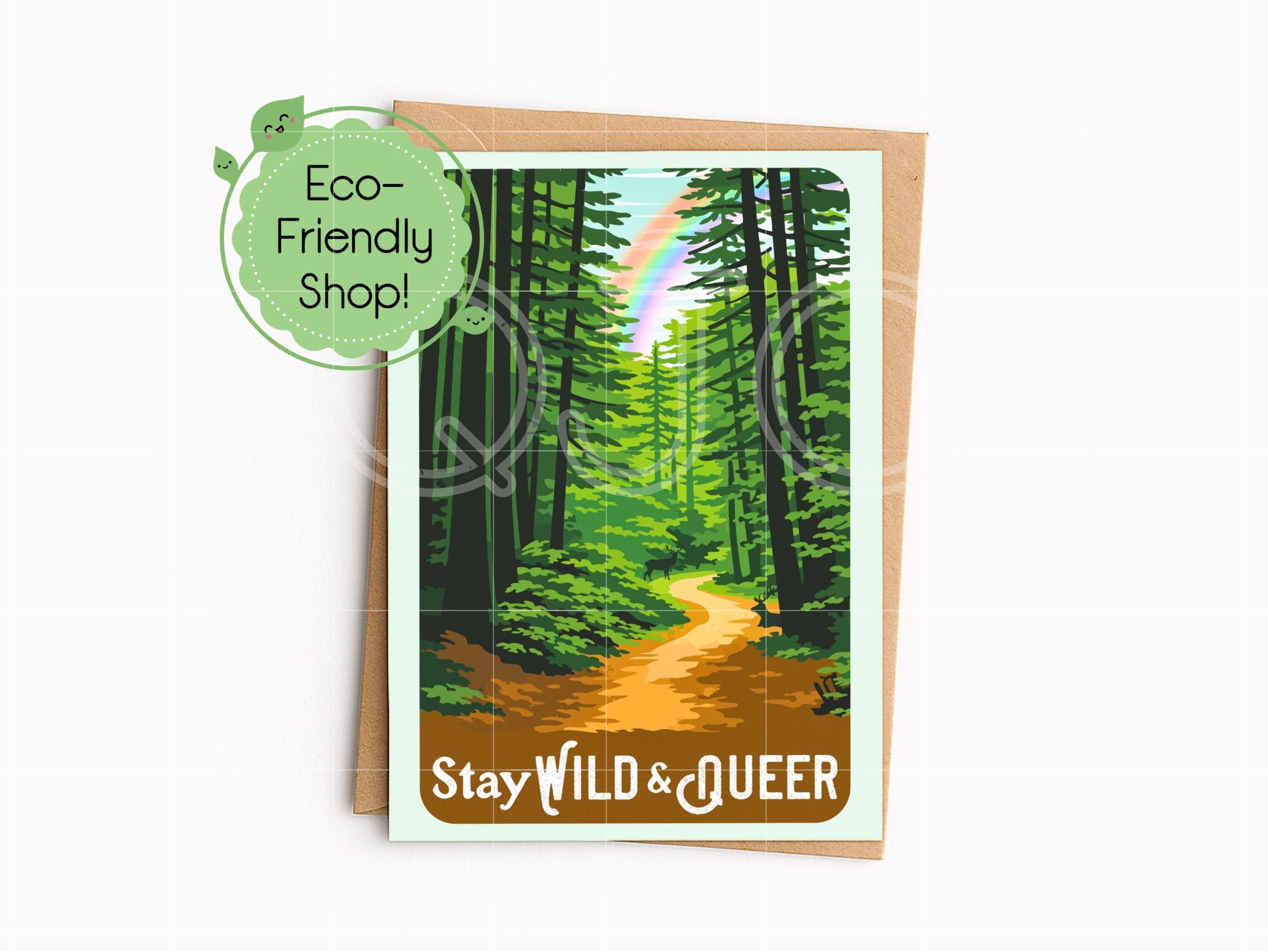 A Vertical 5 inch by 7 inch card with a rainbow, a forest path surrounded by trees and deer that reads Stay Wild and Queer with a kraft envelope